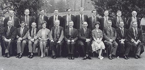Grammar school staff in 1963, in two rows in the garden of the Waterhouse building.